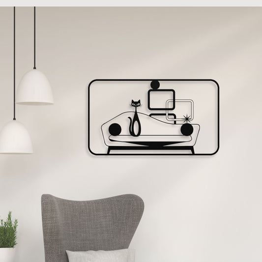 Metal wall art of a black cat on a retro couch in atomic mid-century modern style