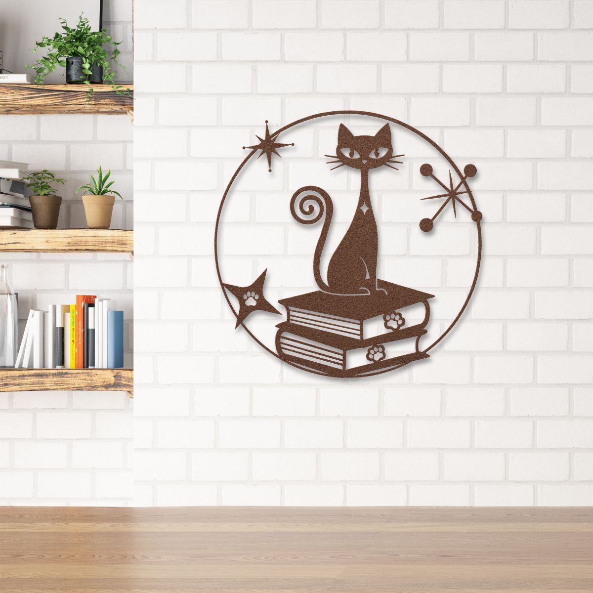 Decorative wall art of a cat on books with a retro design on a white brick wall.