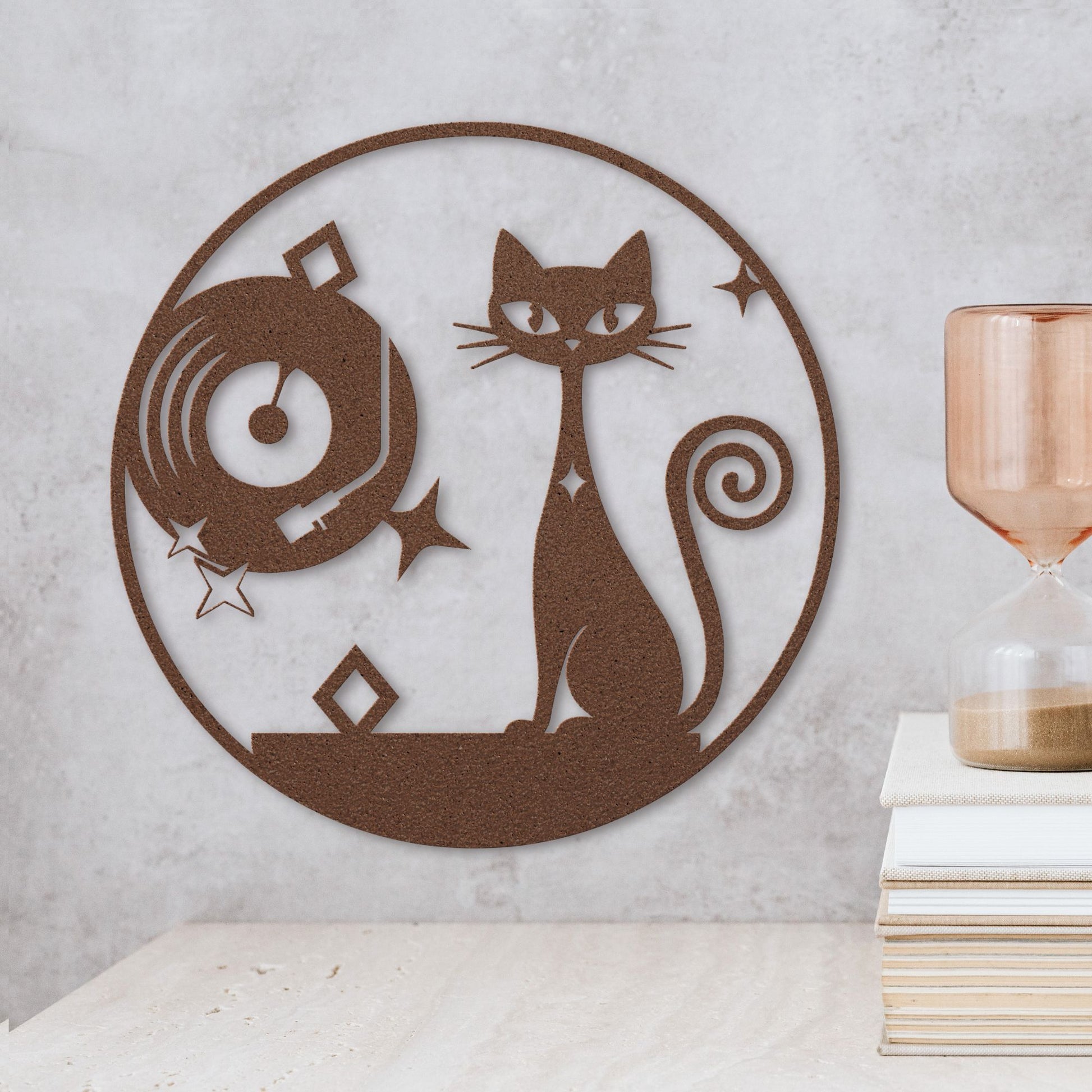 cooper metal wall art with a atomic cat design on a textured wall.