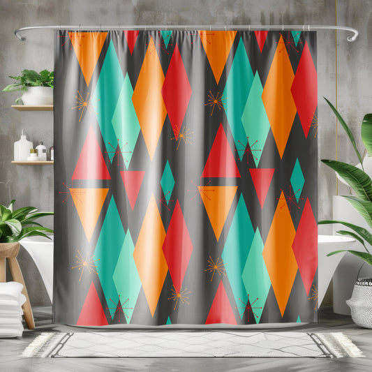 Mid-century shower curtain with colorful retro diamonds in red, orange, teal, and atomic starbursts on a dark gray background