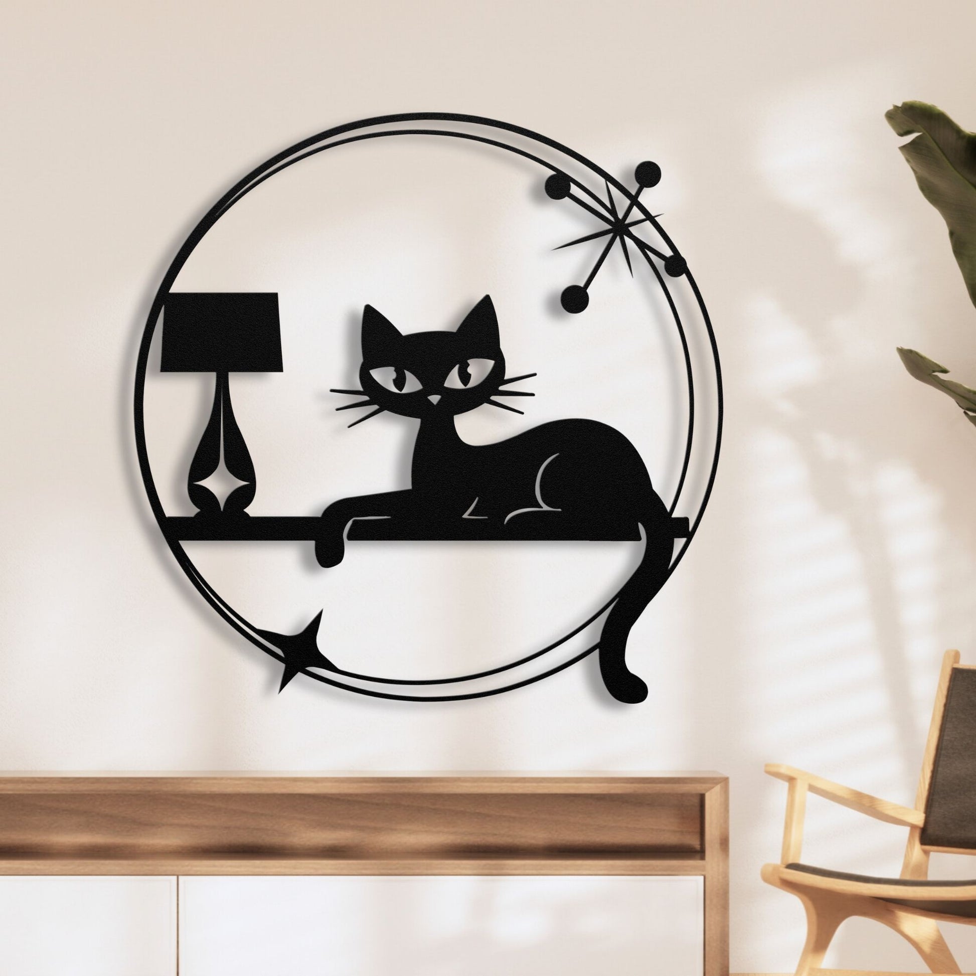 Mid-century modern metal wall sign featuring a black cat lounging on a shelf beside a lamp