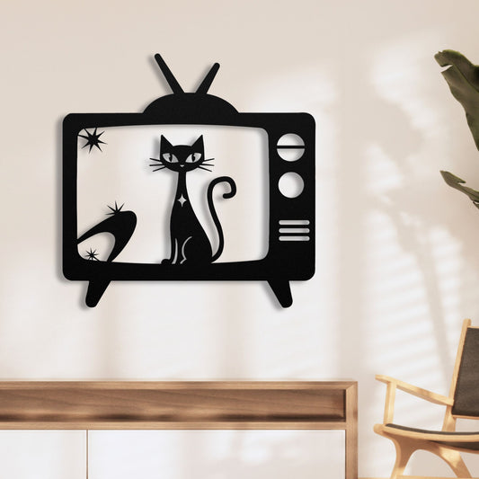 Metal wall sculpture shaped like a TV with atomic star and cat design, retro home decor