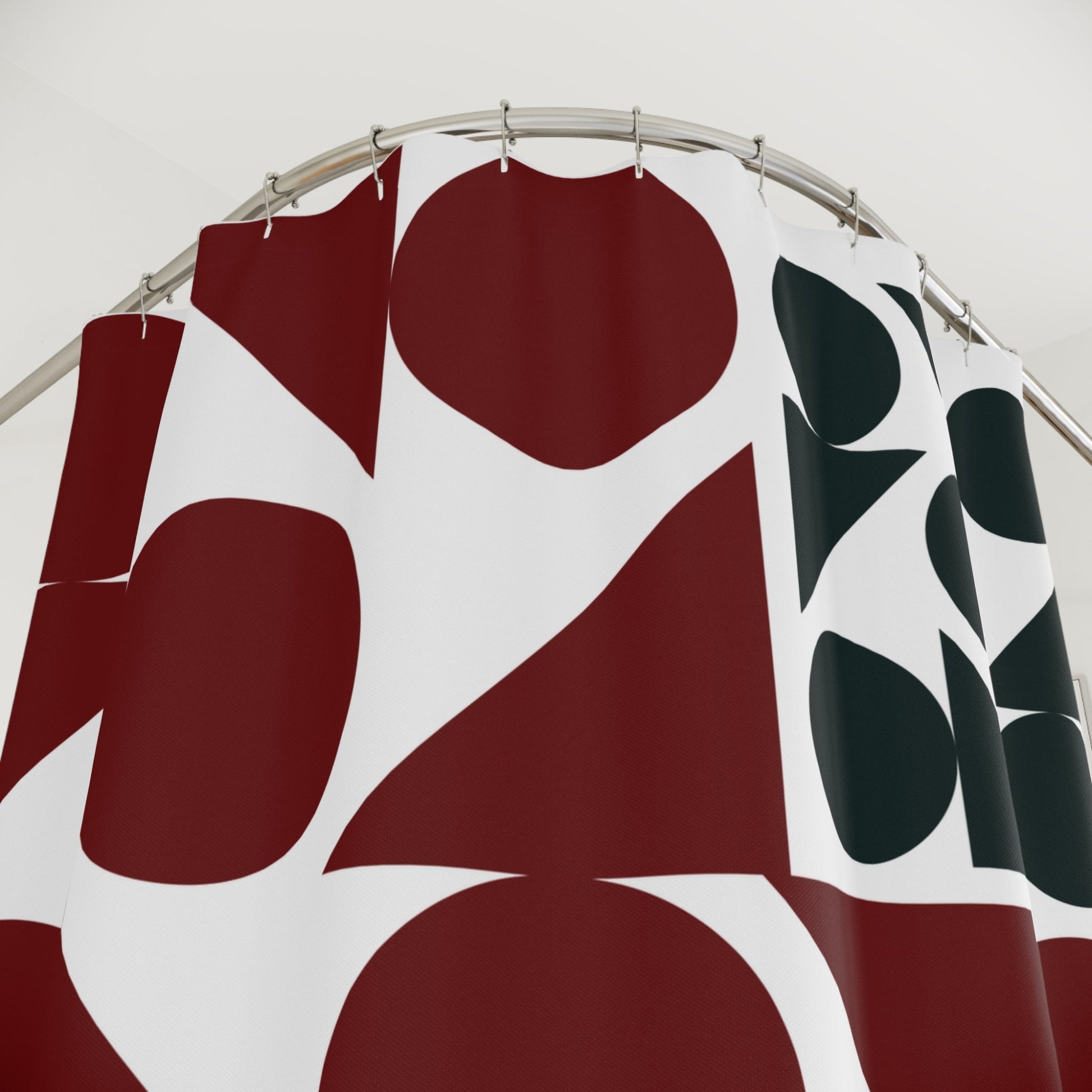 Mid-century modern geometric shower curtain with bold patterns in a retro-inspired color palette, adding a stylish touch to any bathroom.