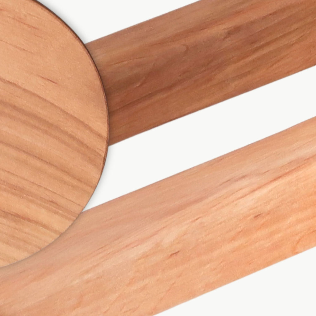 Natural alder wood surface with warm reddish tone, suitable for sauna use