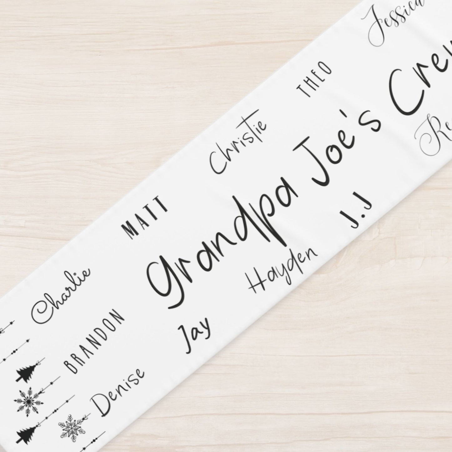 Custom holiday table runner with family name and names of loved ones, modern minimalist style