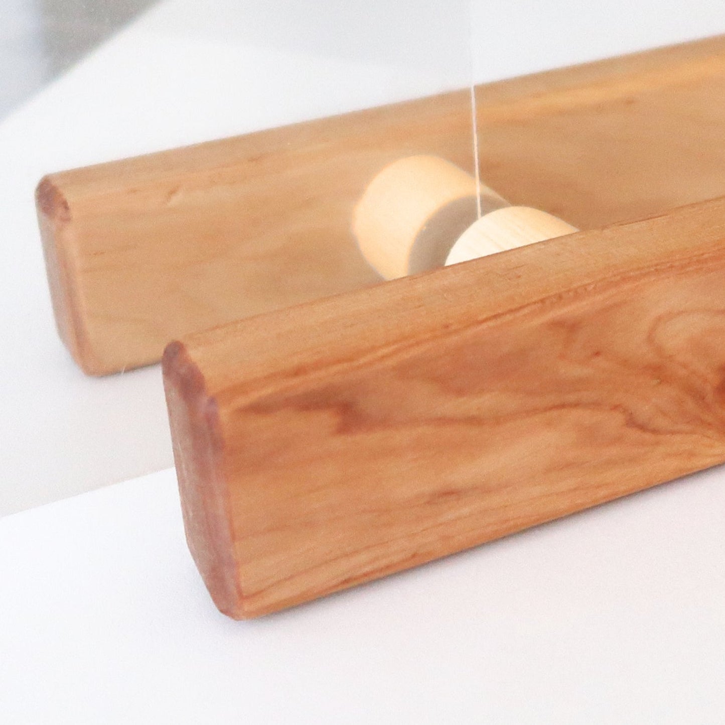 Close-up detail of solid alder wood sauna door handle