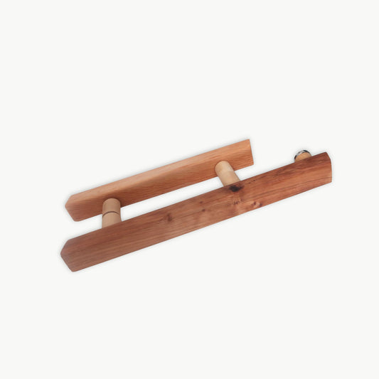 Wooden door handle on a white background