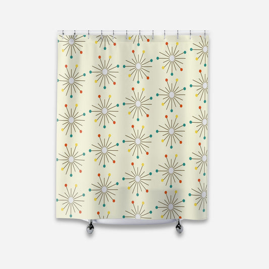 a shower curtain - retro design with atomic patterns on a cream background.