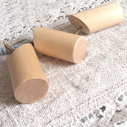 Close-up of a handcrafted solid birch wall hooks