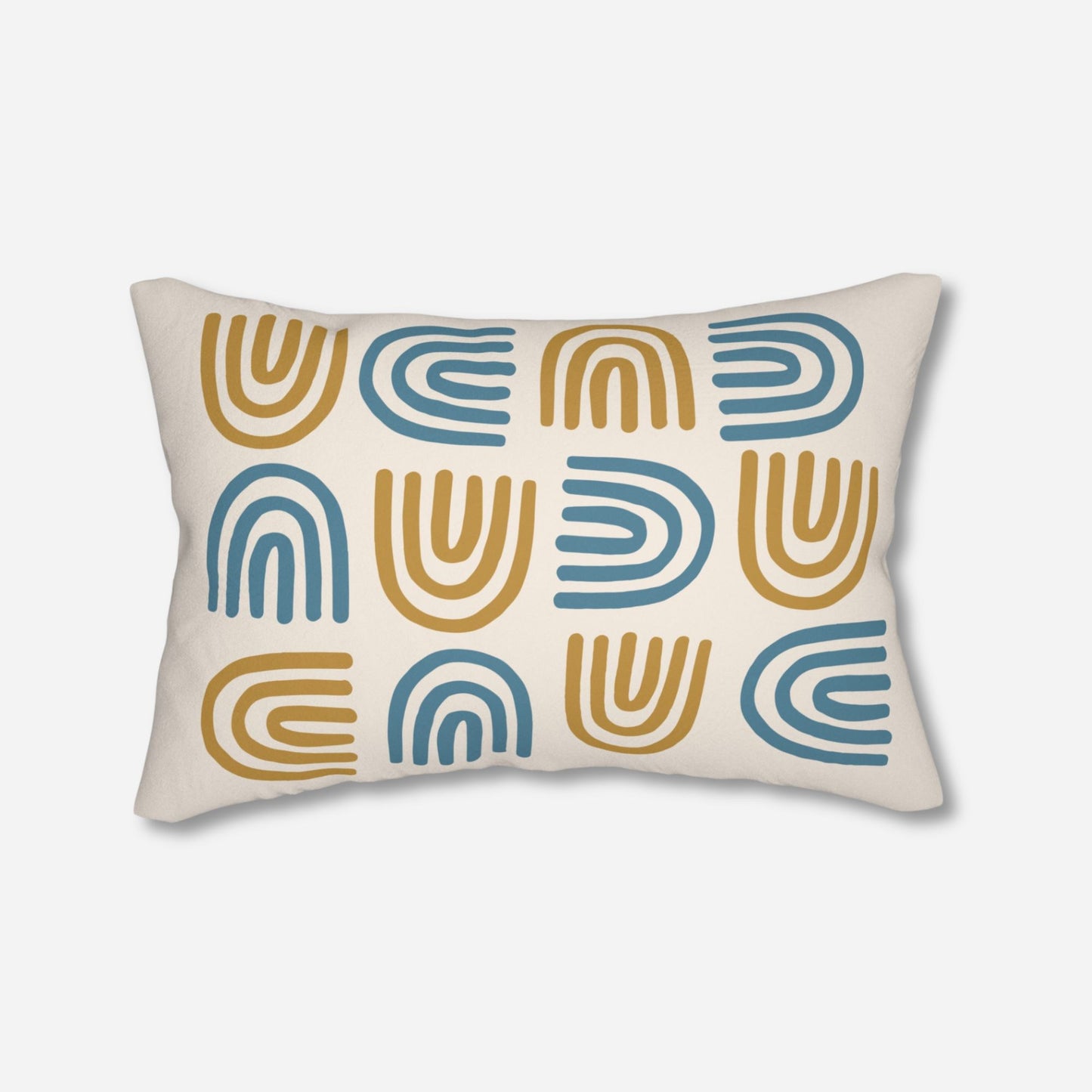 Decorative lumbar pillow showcasing a pattern of blue and mustard yellow arches on a beige fabric