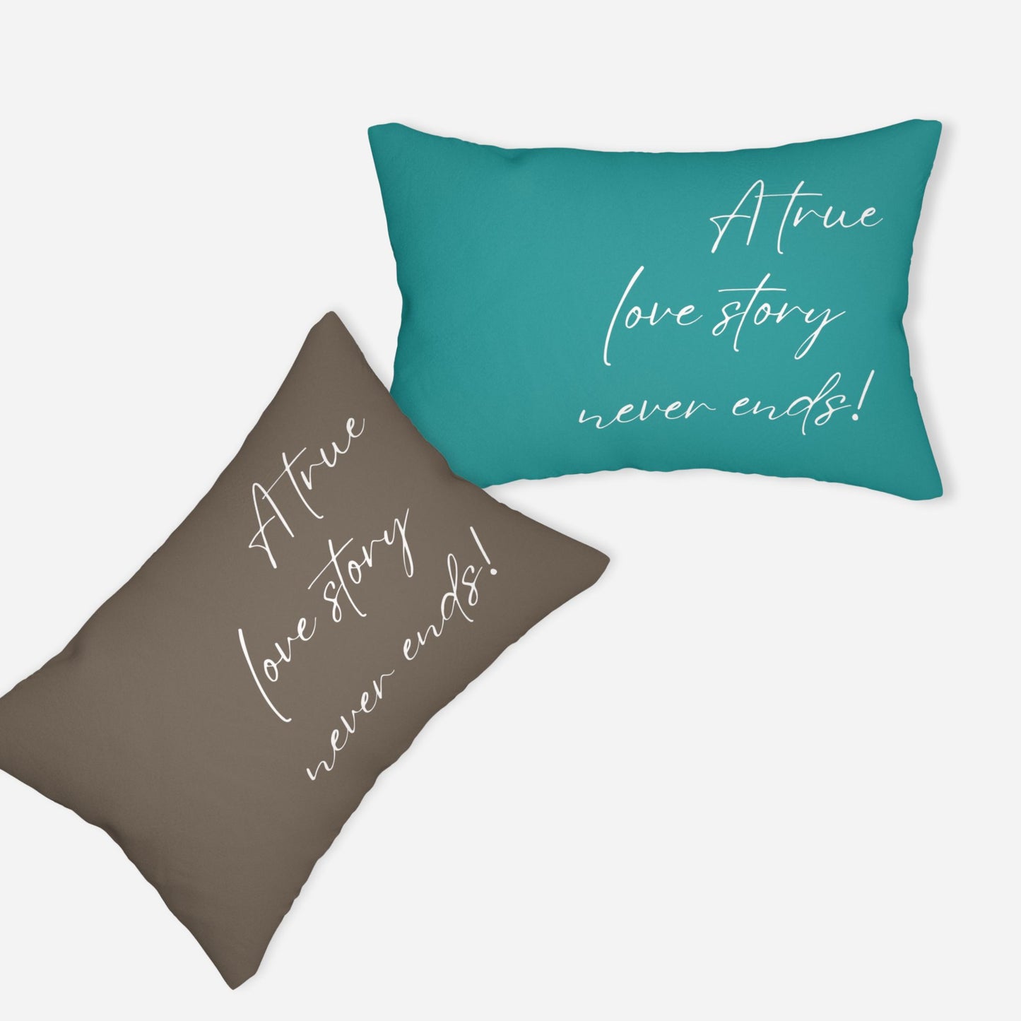 Personalized pillows displaying the phrase "A true love story never ends!" in cursive font, with one pillow in a brown background and the other in sea.