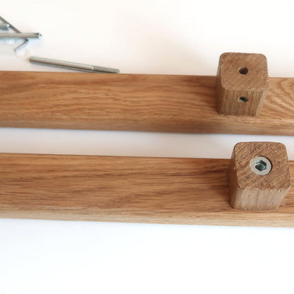 Double-sided oak door handle mounting and fixing detail