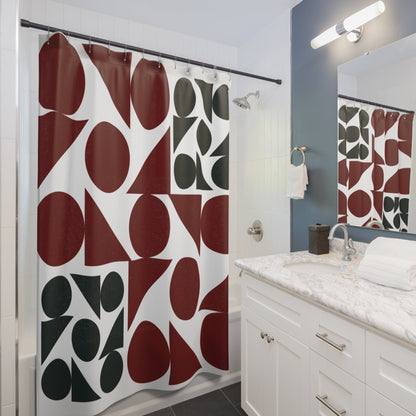 A stylish bathroom with a shower curtain featuring a contemporary geometric print in dark cherry, green on a white background.