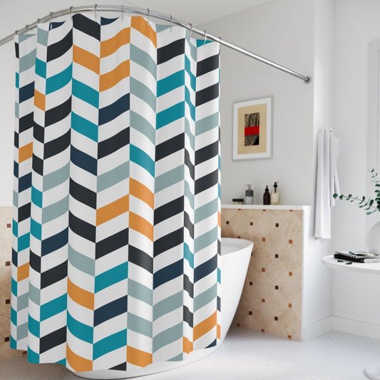 A stylish bathroom with a geometric shower curtain in blue, orange, and gray chevron stripes.