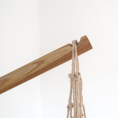 Angled oak wall hook with notch for hanging small planters or lamps