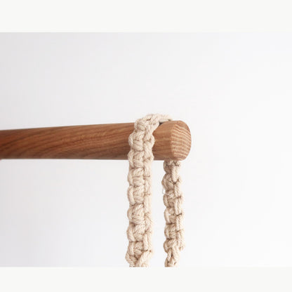 Minimalist oak wall hook with notch for hanging planters, made of solid oak