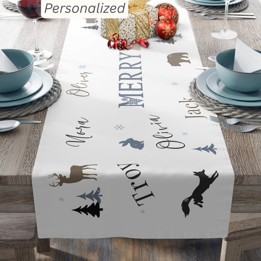 Table runner with personalized text and animal illustrations on a set table.