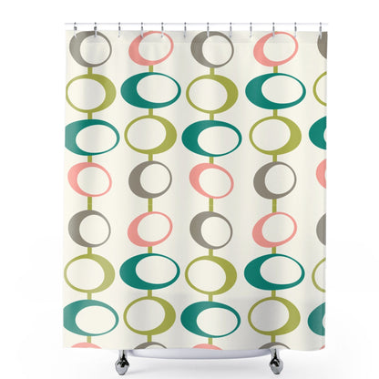 A shower curtain adorned with a vintage geometric pattern of multicolored ovals in pink, green, teal, and beige.