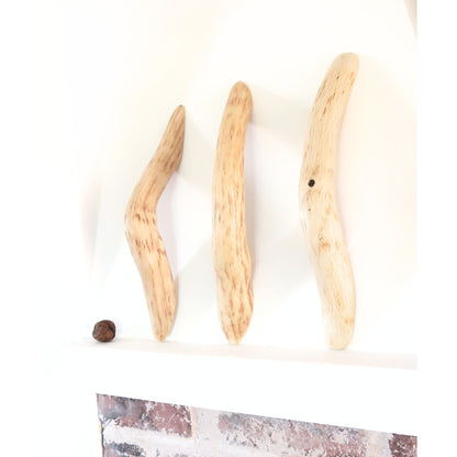 Three handcrafted thick oak branch door pulls with organic natural curves