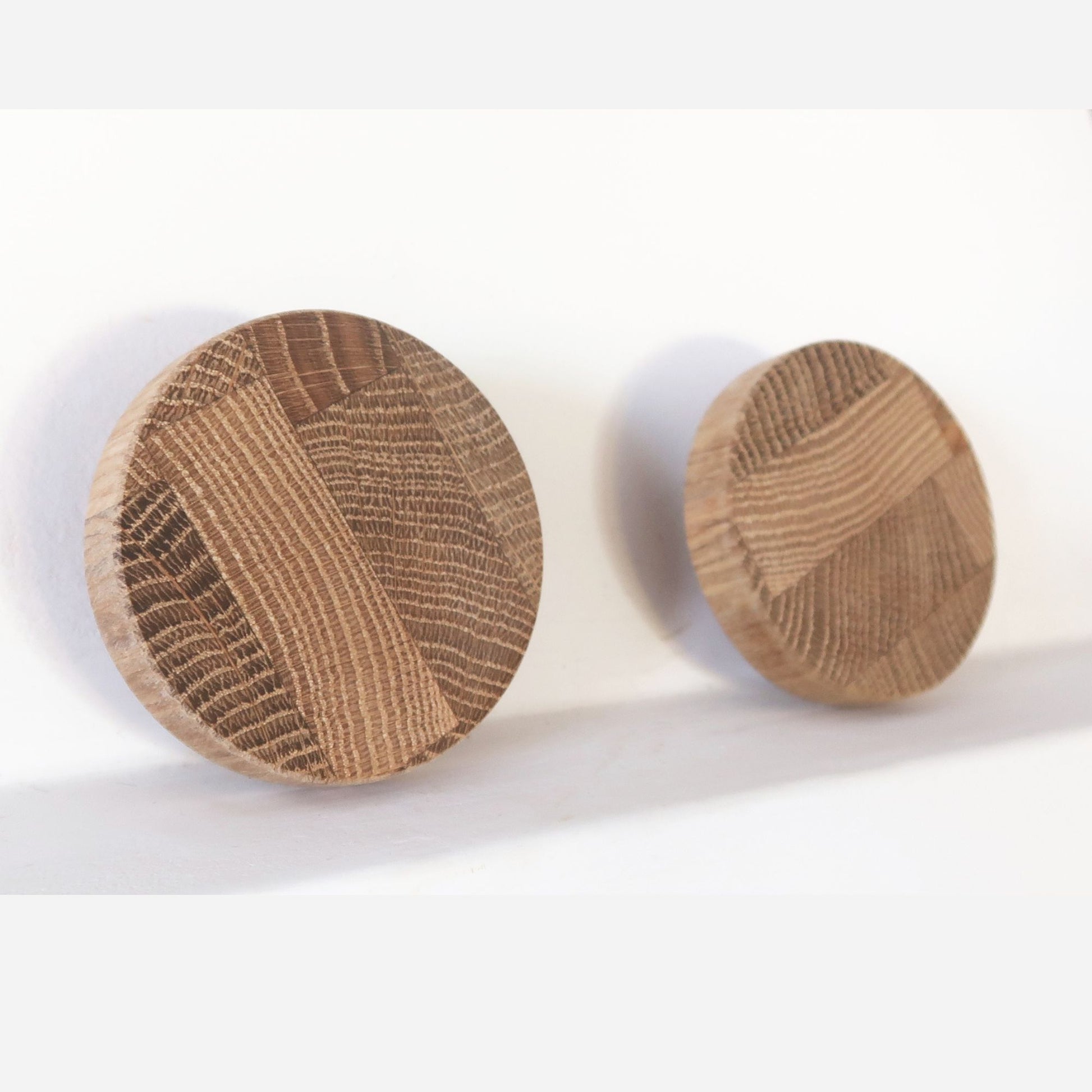 Handmade oak end-grain cabinet knobs with a natural wood pattern