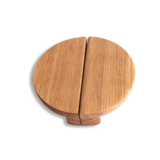 Handmade oak half-moon cabinet handles forming a full circle