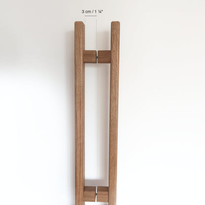 solid oak door handle with measurement label on a white background