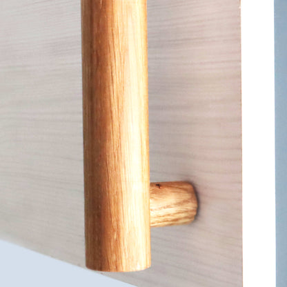 Handmade long solid oak door handle with a minimalist cylindrical design