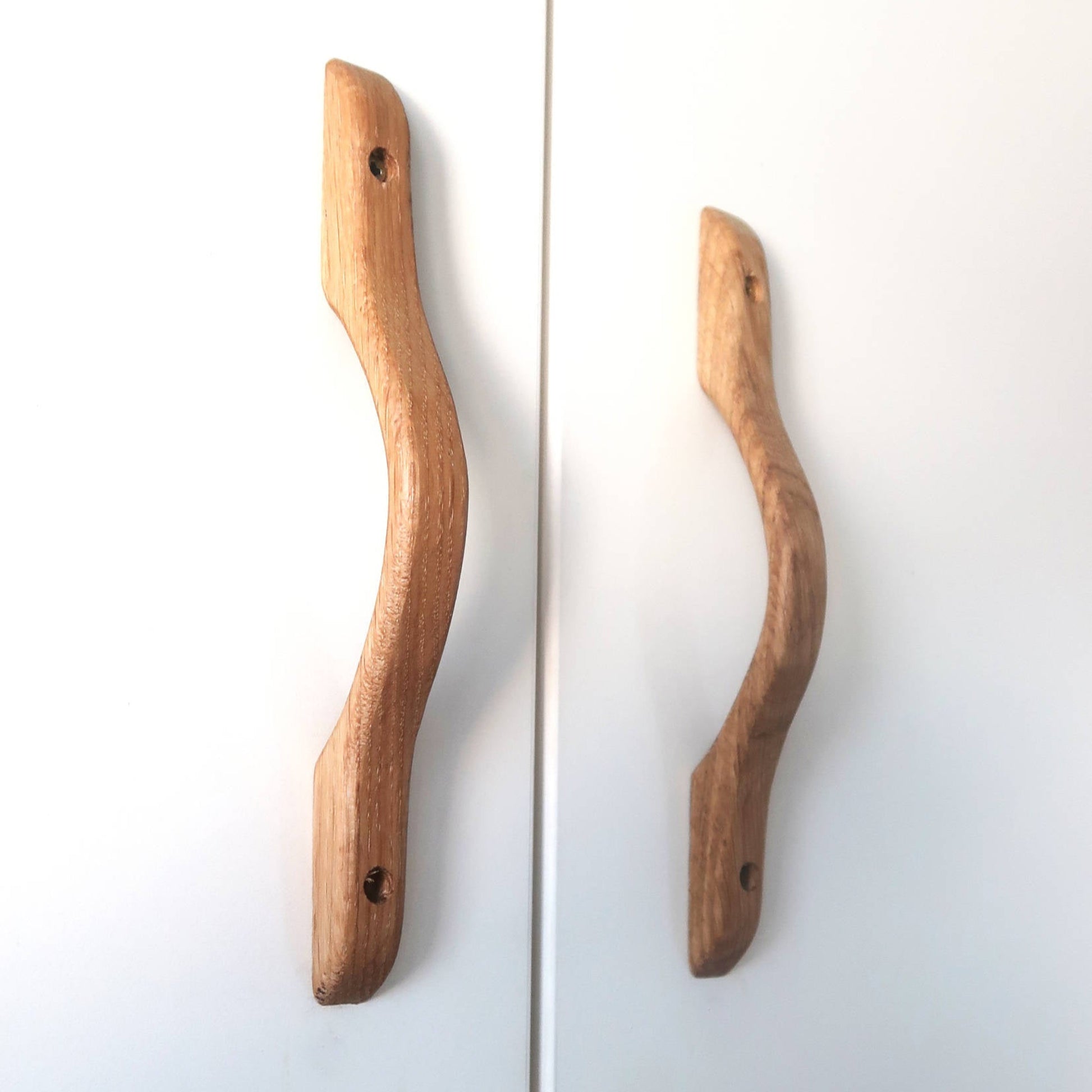 Ergonomic curved design for easy grip and comfort oak cabinet handle