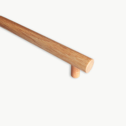 Wooden cabinet handle on a white background