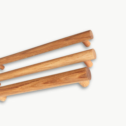 Set of oak handles on a white background