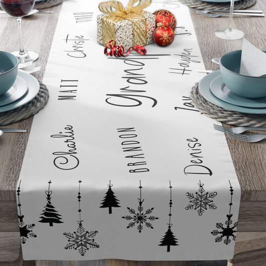 Personalized Christmas table runner with family names in black and white design