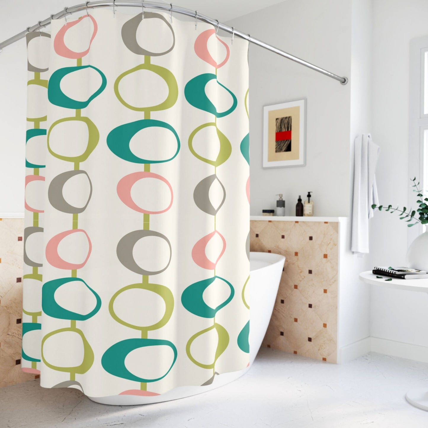 A shower curtain displaying a mid-century modern design with overlapping ovals in pastel pink, green, teal, and grey.