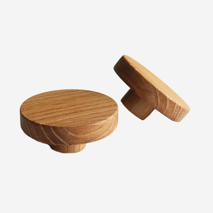 Handcrafted solid oak drawer knobs with a rustic natural wood finish for dressers & cabinets.