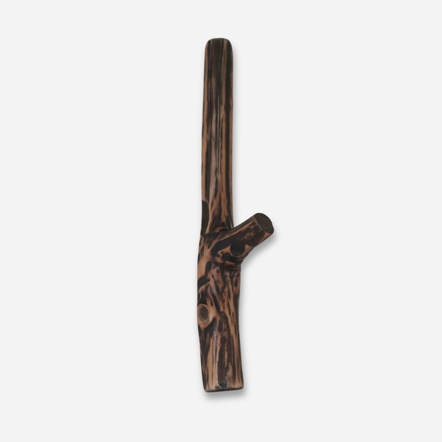 One rustic oak wall hook designed to look like a branch, with a distinctive burnt pattern and a natural finish, displayed on a white background.