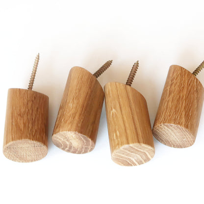 Four short corner hooks made from solid oak