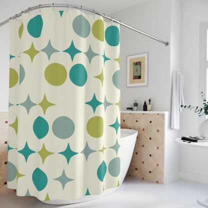 Cream shower curtain with green and teal ovals and starbursts in a contemporary bathroom .