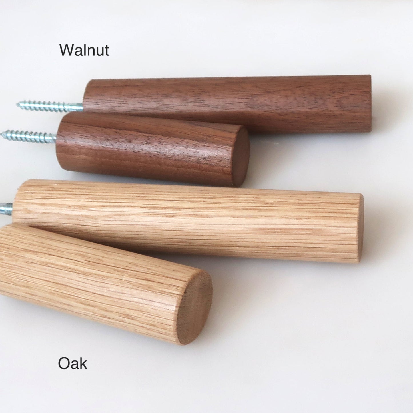 Collection of solid wood wall hooks in oak and walnut