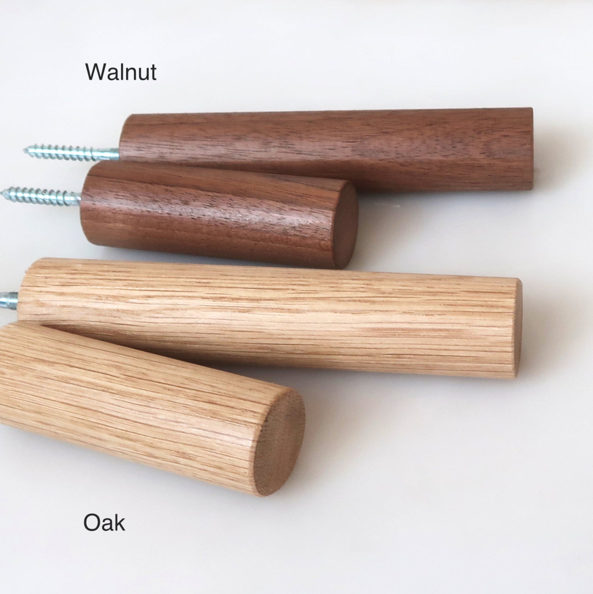 Collection of solid wood wall hooks in oak and walnut