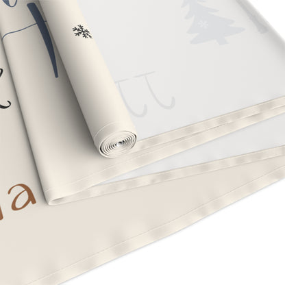 Roll of beige runner with printed text and graphics on a white background