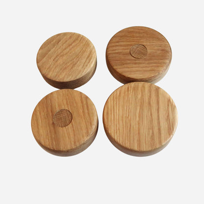 Double-sided wooden door knob made from oak, showcasing its natural grain.