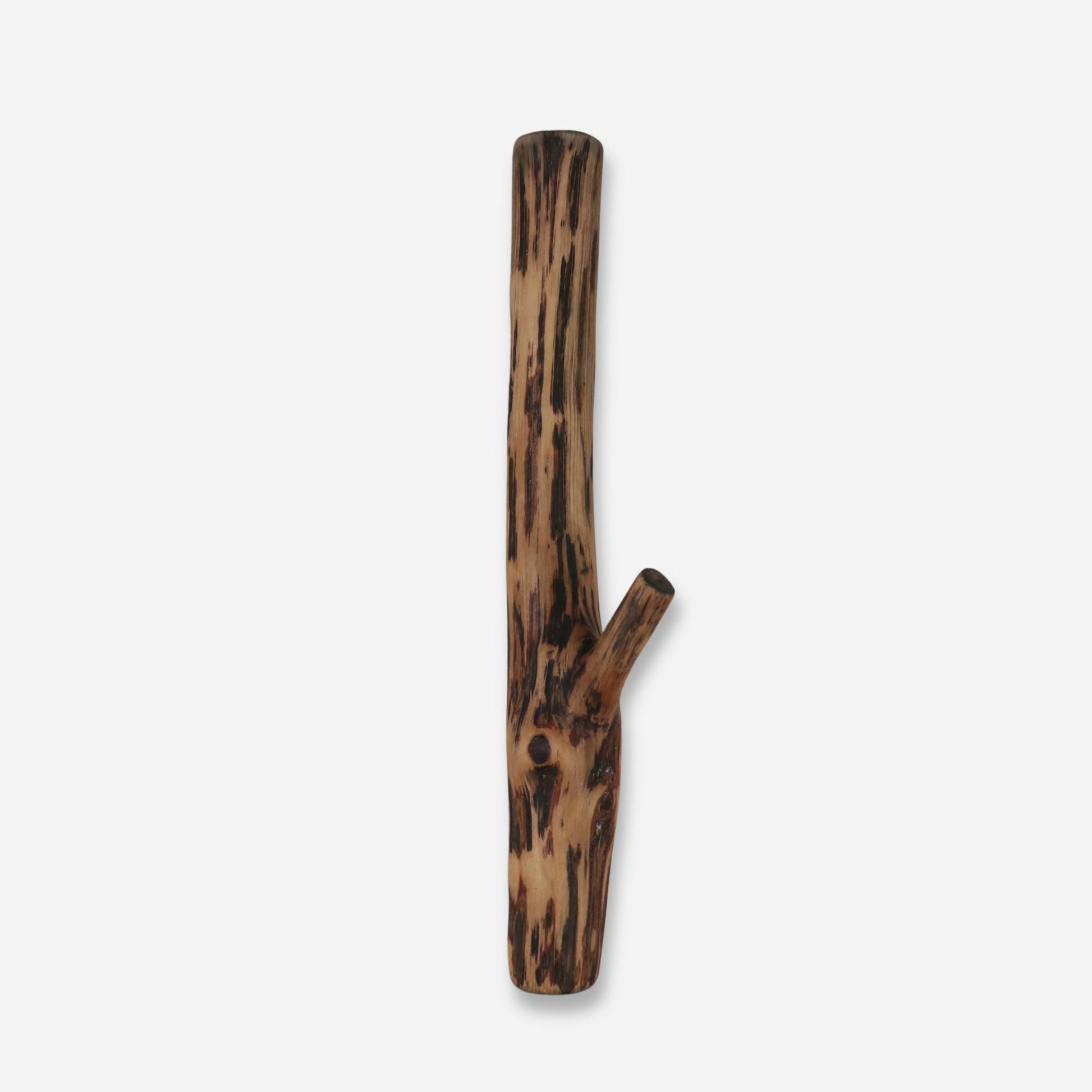 Rustic burnt wood wall hooks crafted from real branches, perfect for natural home decor